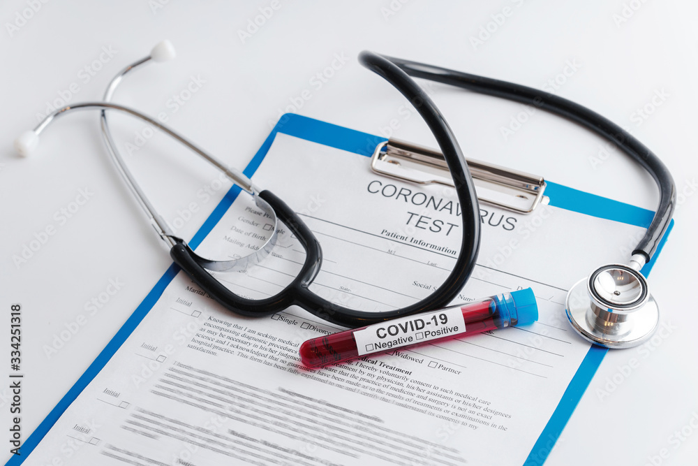 Blood samples and stethoscope on white background Blood samples and stethoscope on white background