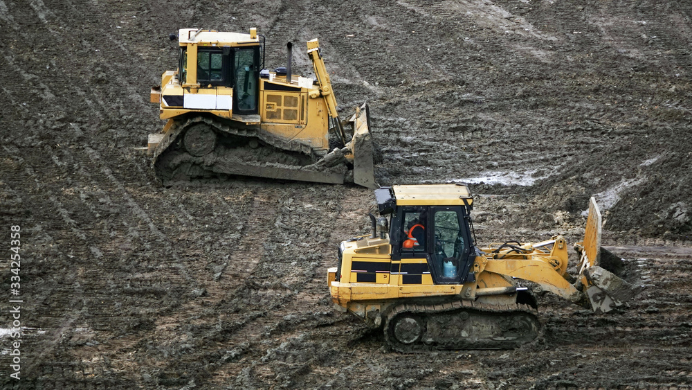 Excavators and tractors