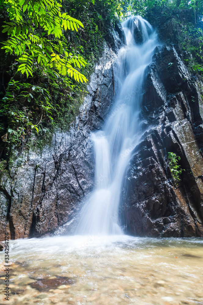 Mountain waterfall in deep tropical forest Mountain waterfall in deep tropical forest