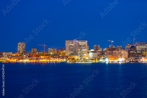 Halifax City skyline at night from Dartmouth waterfront, Nova Scotia NS, Canada.