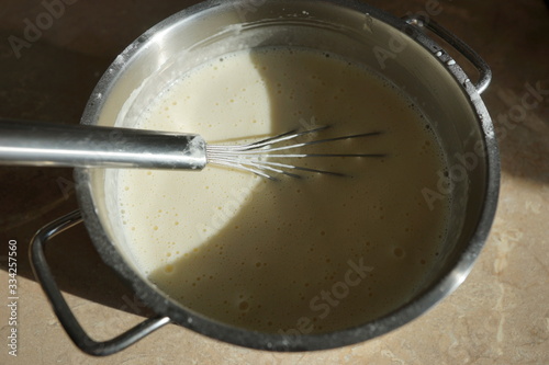 Pancake dough on a table in the kitchen