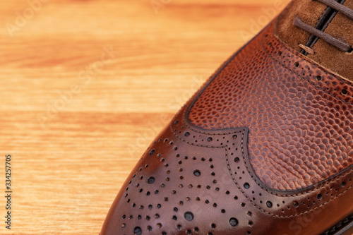 Canvastavla Leather shoes elegant oxford style in brown color on wooden background