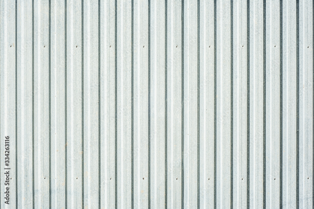 Closeup of grey corrugated steel panel Closeup of grey corrugated steel panel