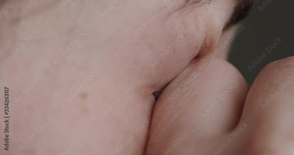 Face touch - coronavirus concept. Woman touching his eye, increase risk to viral infection. Touching the facial mucous membranes by hand. Way to pick up infections like COVID-19. Macro Face touch - coronavirus concept. Woman touching his eye, increase risk to viral infection. Touching the facial mucous membranes by hand. Way to pick up infections like COVID-19. Macro