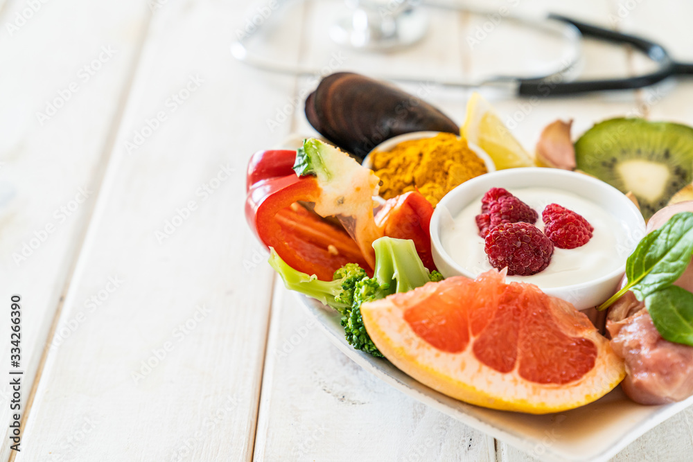 Selection of food to boost immune system - healthy, rich in vitamin and antioxidants, copy space Selection of food to boost immune system - healthy, rich in vitamin and antioxidants, copy space