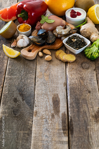 Selection of food to boost immune system - healthy, rich in vitamin and antioxidants, copy space