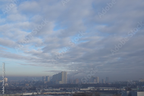 Smog over the buildings and quarters of Kiev © SERHII BLIK