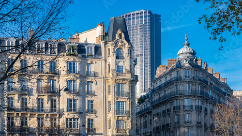 Paris, typical buildings, beautiful facades with the Montparnasse tower in background