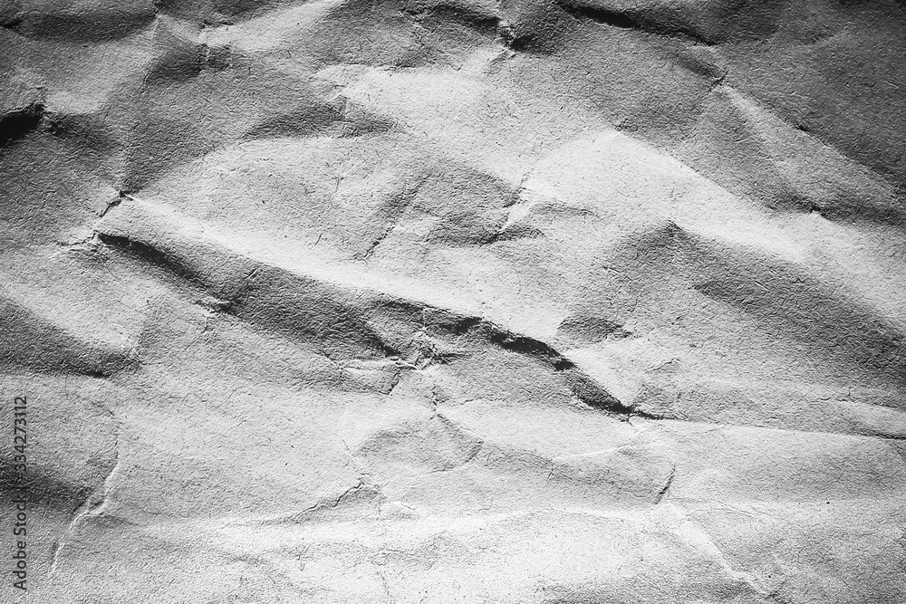 Naklejka premium Crumpled white texture black background for style