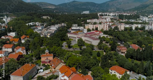 Mostar city and Hrvatski dom Herceg Stjepan Kosača from the air Aerial view, Zoom in photo