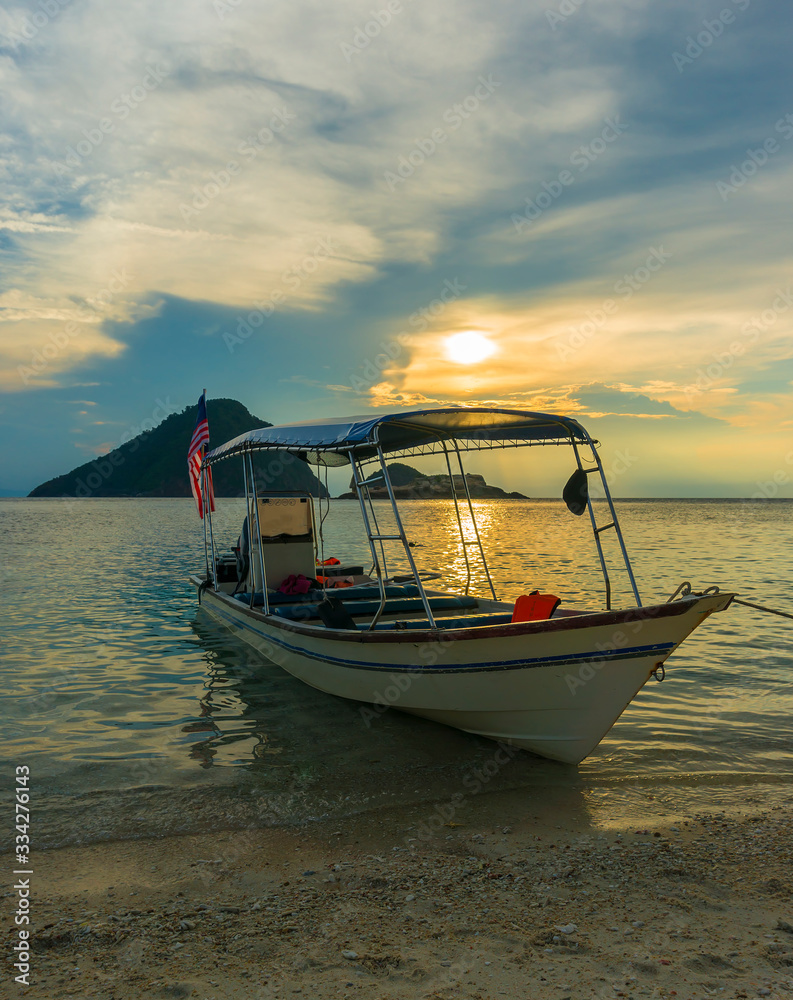 Boat with sunset background
