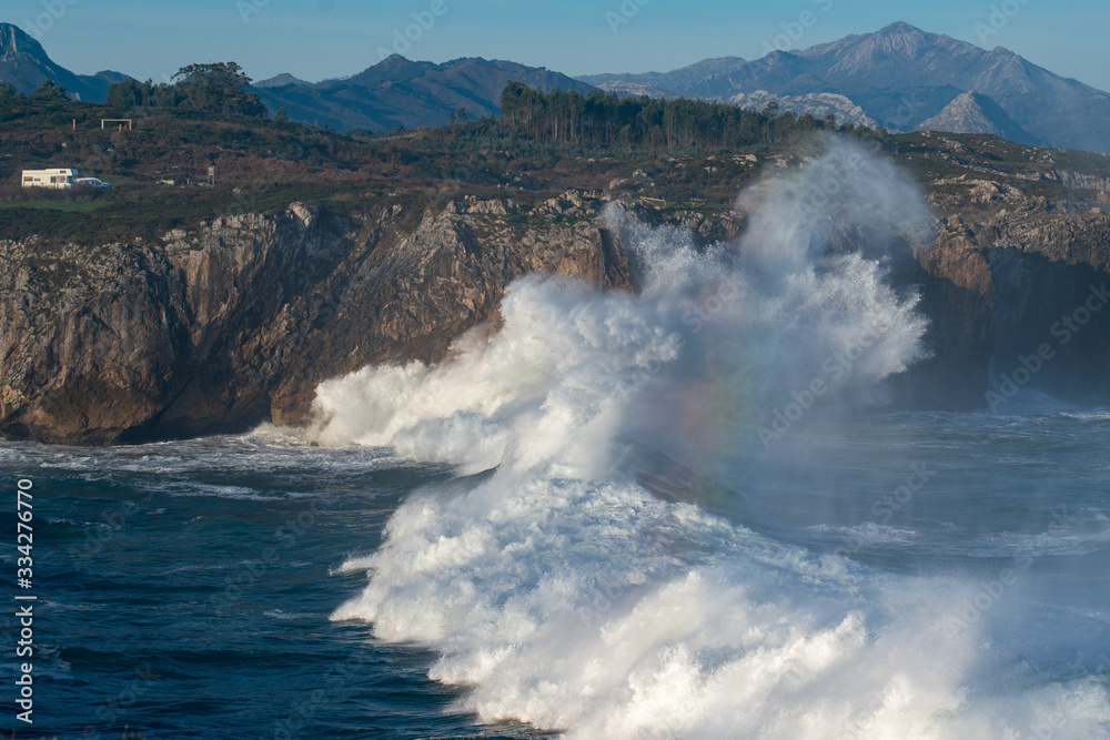 Wave crashing into the cliffs at Bufones de Pria, Asturias, Spain