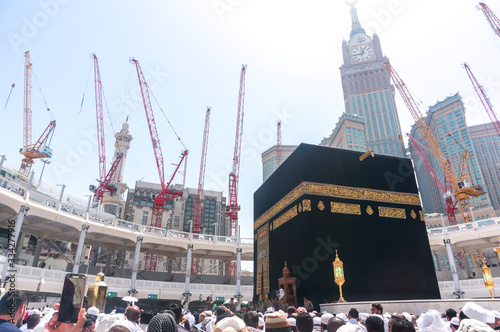 MECCA, SAUDI ARABIA-MAR,13 2015:Skyline with Abraj Al Bait (Royal Clock Tower) in Makkah. The tower is the tallest clock tower in the world at 601m (1972 feet), built at a cost of USD1.5 billion.. photo