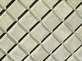 Gray concrete slab with a diagonal pattern.