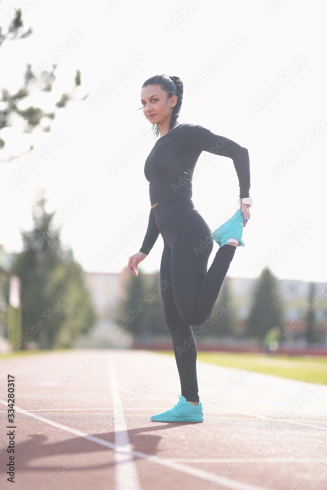 Fototapeta premium Woman Runner Warm Up Outdoor