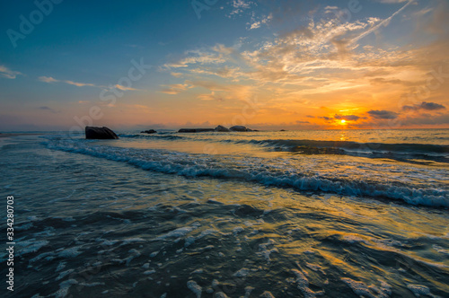 Beach with sunrise background