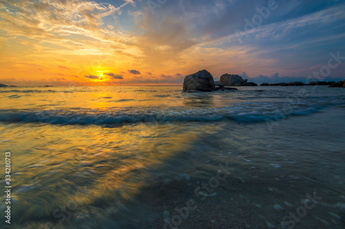 Beach with sunrise background