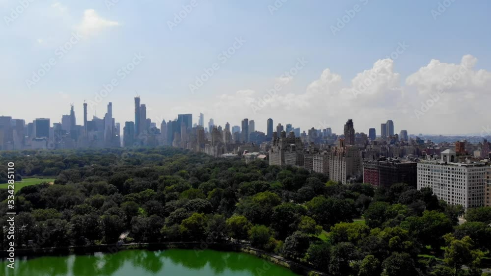 Concept of travel sightseeing on Manhattan island from birds eye during helicopter tour, aerial above of urbanity lifestyle of New York skyline buildings and scenic view near Central Park Concept of travel sightseeing on Manhattan island from birds eye during helicopter tour, aerial above of urbanity lifestyle of New York skyline buildings and scenic view near Central Park