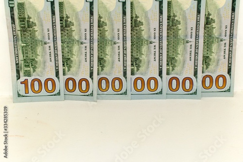 one trillion dollars on a white wall photo