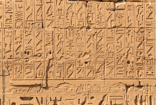 Luxor Governorate, Egypt, Karnak Temple, complex of Amun-Re. Embossed hieroglyphics on columns and walls. The third pylon.