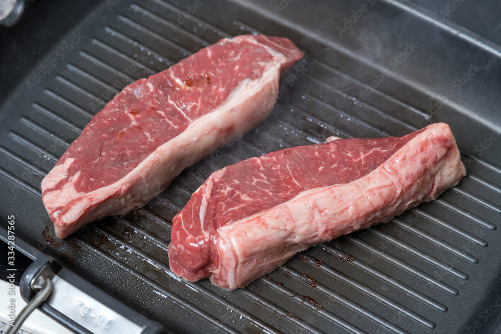pan-fried beef steak. brown crust on the meat.