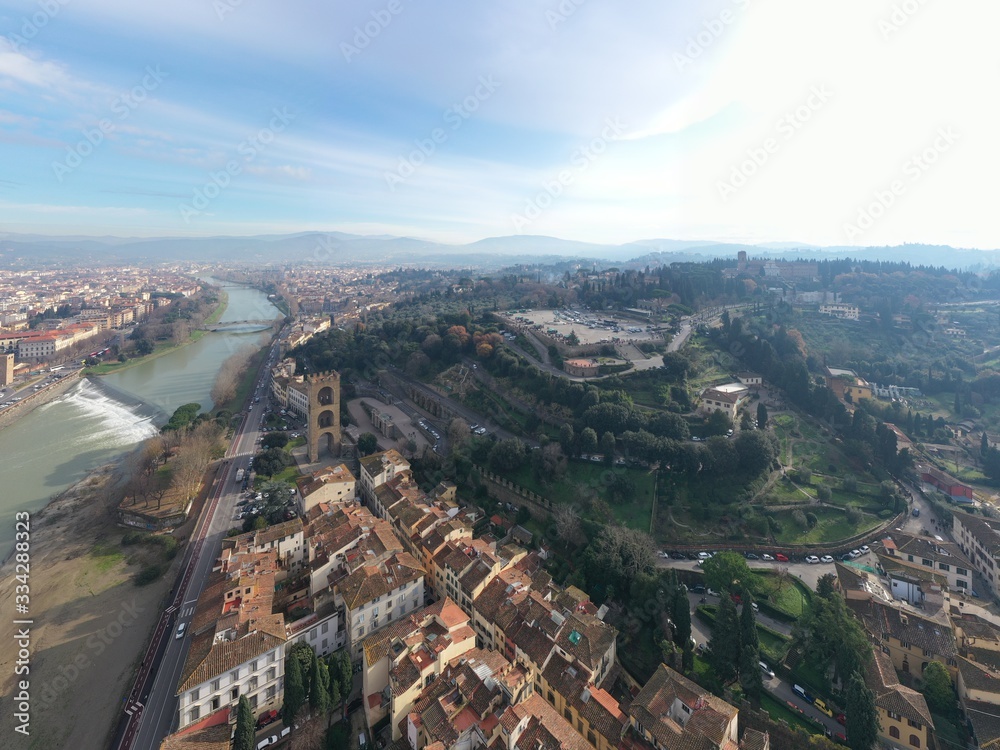 Aerial panorama of Florence at sunrise, Firenze, Tuscany, Italy, cathedral, river, drone pint view, mountains is on background