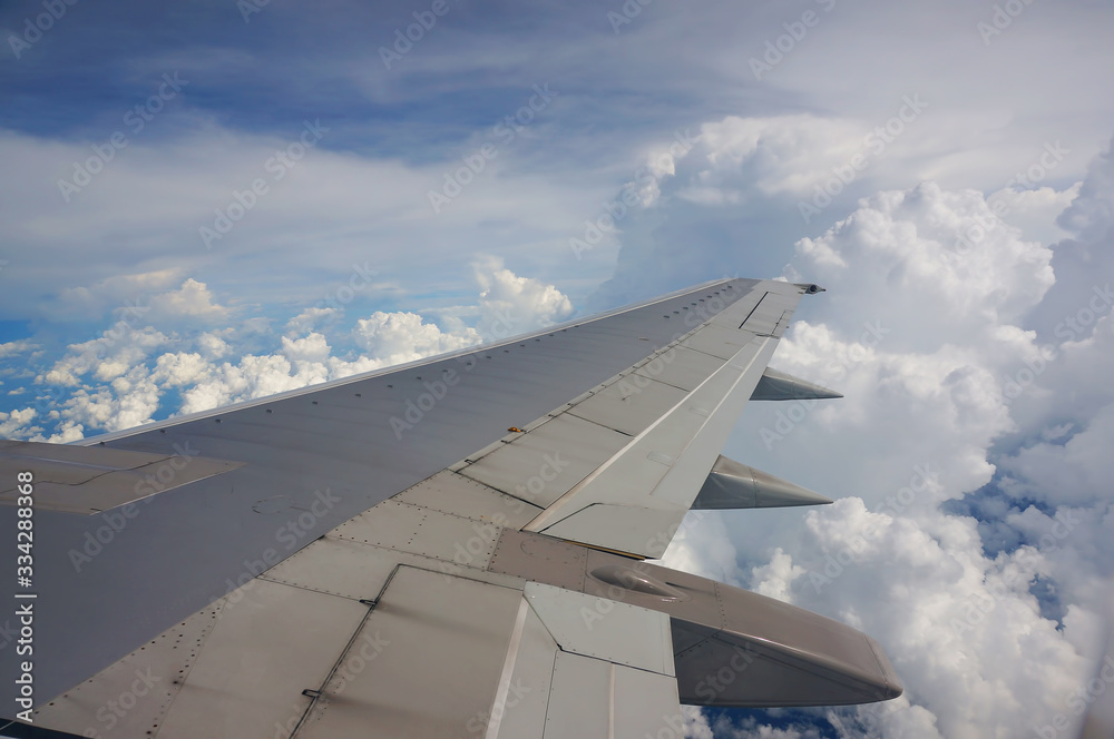 Aerial view of cloudy sky from aircraft windows