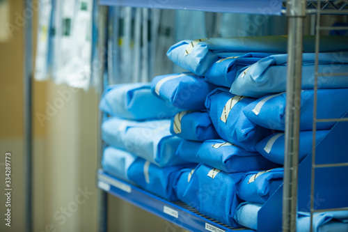 Fototapeta Personal Protective and sterilized gowns ready for doctors and nurses in hospita