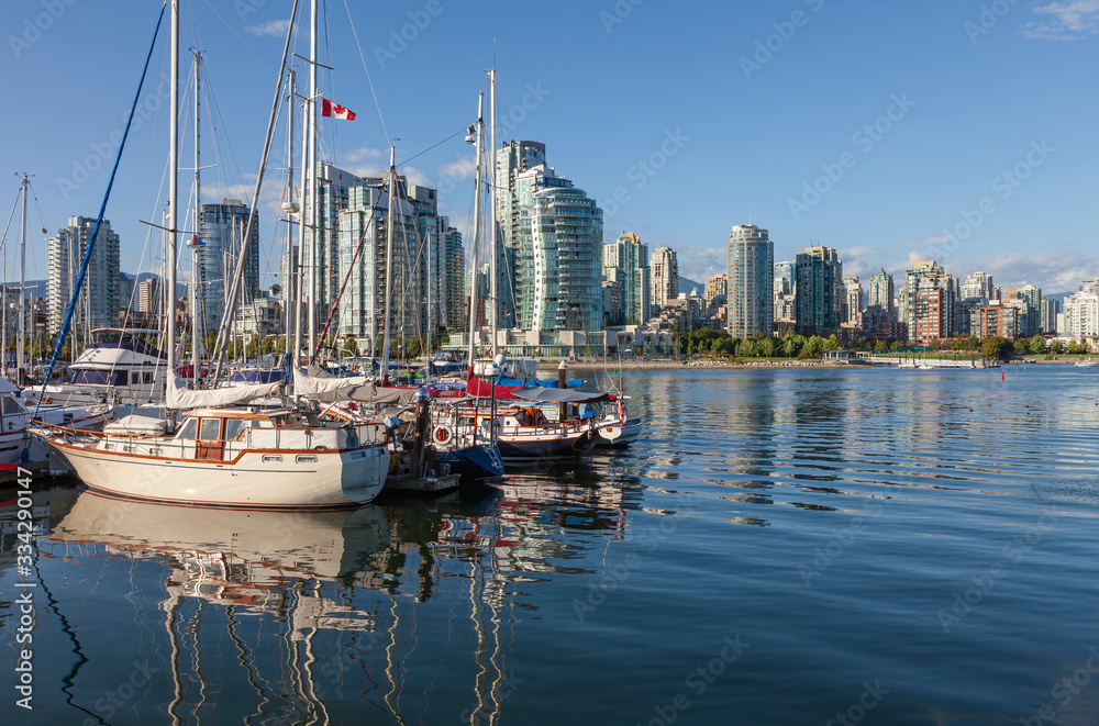 Vancouver BC.skyline & False Creek river and sailboats.