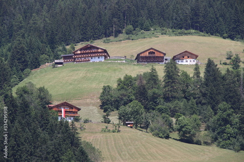 landscape with scattered houses in the mountains photo