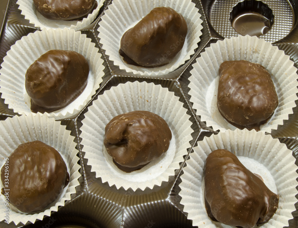 Chocolate candies figs in a box Chocolate candies figs in a box