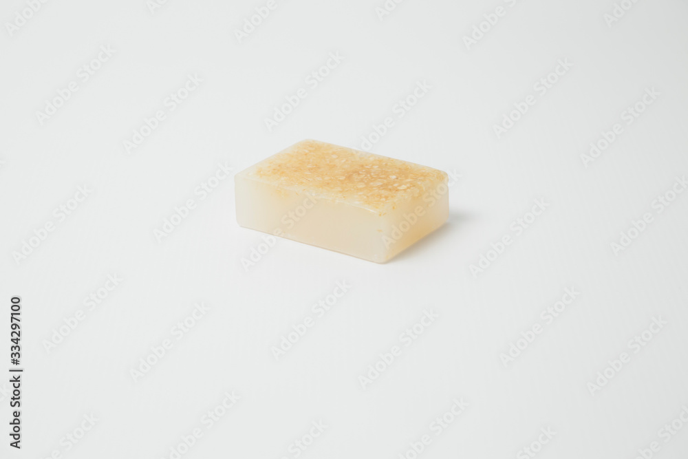 Homemade homemade oatmeal and honey soap on white background - skin care - natural beauty