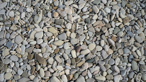 pebbles, small stones from the surface of gray