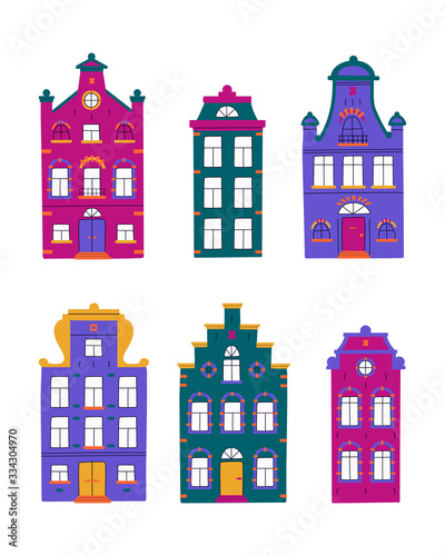 Vector set of minimalistic traditional houses. Vector collection of multi-colored facades of old buildings on white isolated background in scandinavian trendy style.
