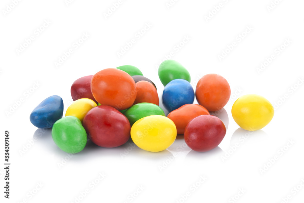 Colorful chocolate coated candies isolated on white background. Colorful chocolate coated candies isolated on white background.