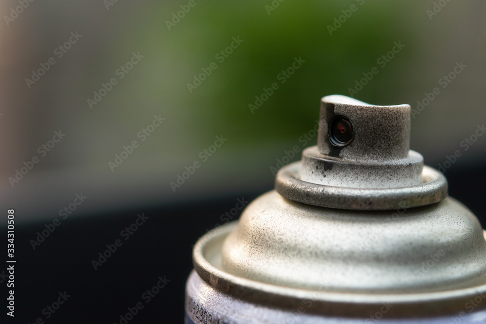 close up head aluminum spray paint can. with copy space close up head aluminum spray paint can. with copy space