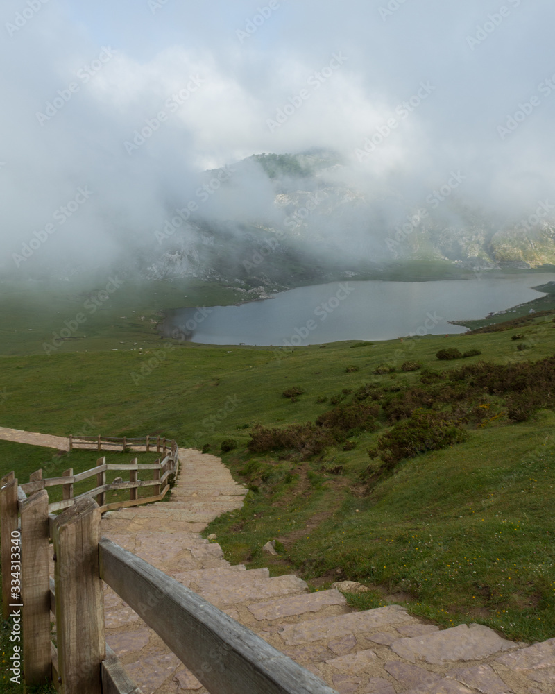 Fototapeta premium stairs to lake in the mountain