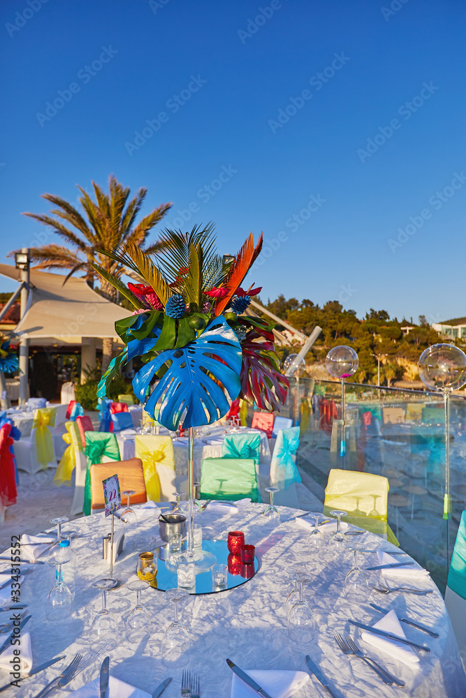 Festive served sea view terrace restaurant for corporate banquet or wedding