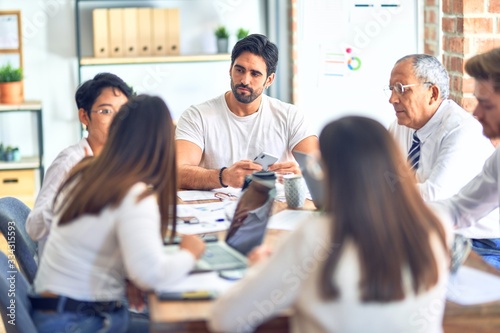 Group of business workers working together at the office