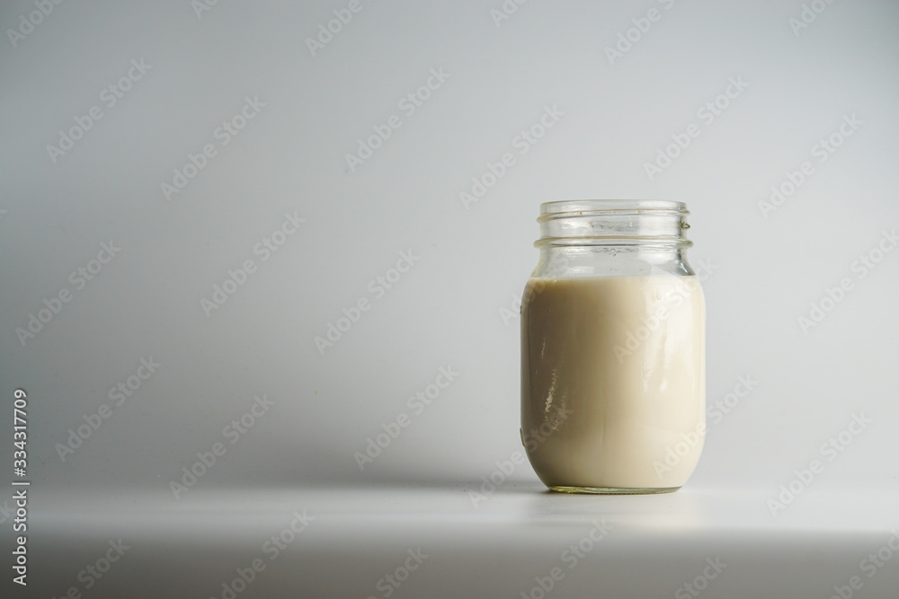 Glass jar of milk Glass jar of milk