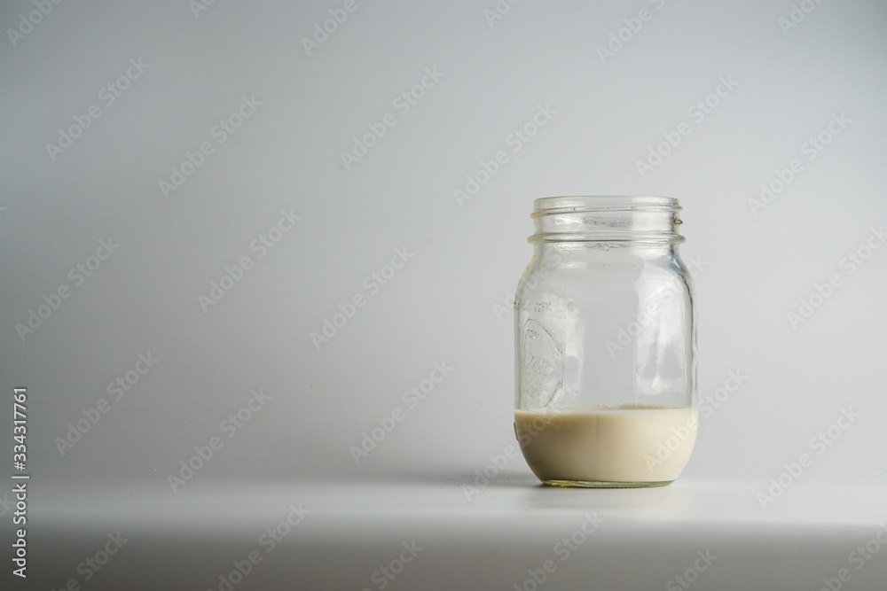 Glass jar of milk Glass jar of milk