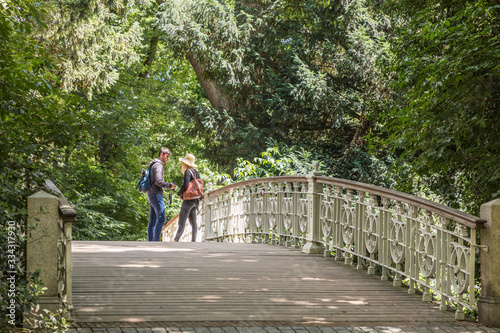 Walk across a bridge in Amsterdam