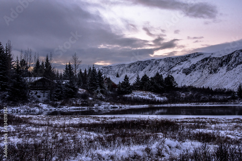 Romantic scenery in Iceland covered by snow. Abandoned lake and mountains, this is Viking´s land during wintertime. Europe.