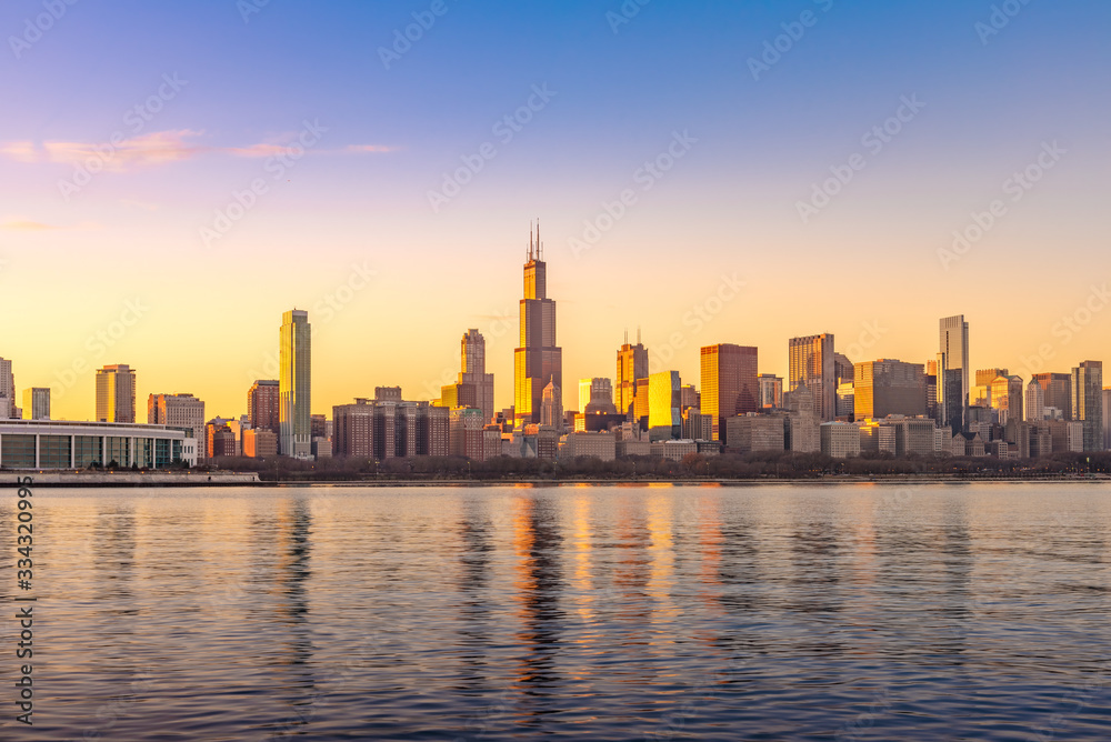 Chicago downtown skyline sunset Lake Michigan with most Iconic building from Adler Planetarium, Illinois