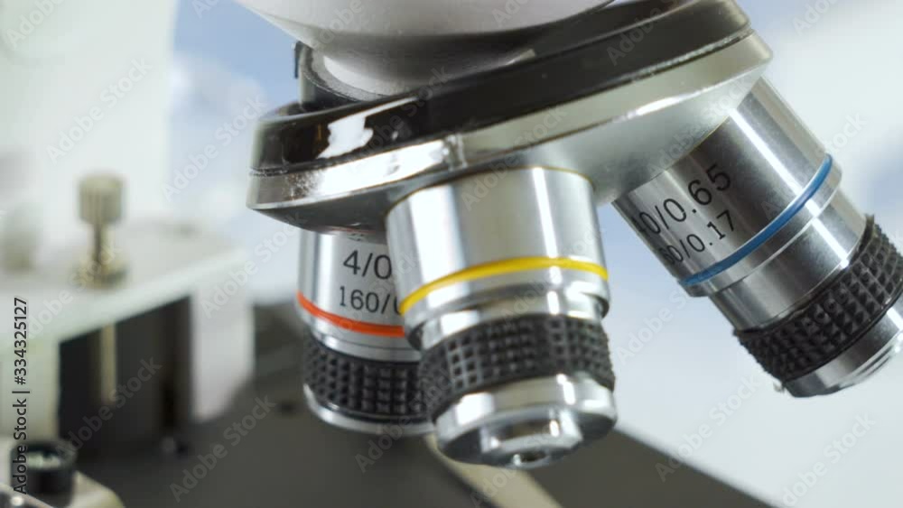 Closer look of the objective lens of the microscope Closer look of the objective lens of the microscope