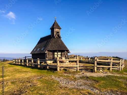 Old wooden church in the mountain Velika Planina, Slovenia