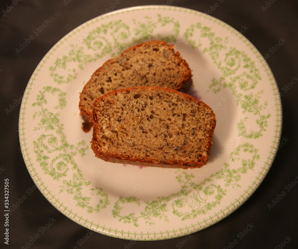 Slice of bread pudding cake on a traditional plate.