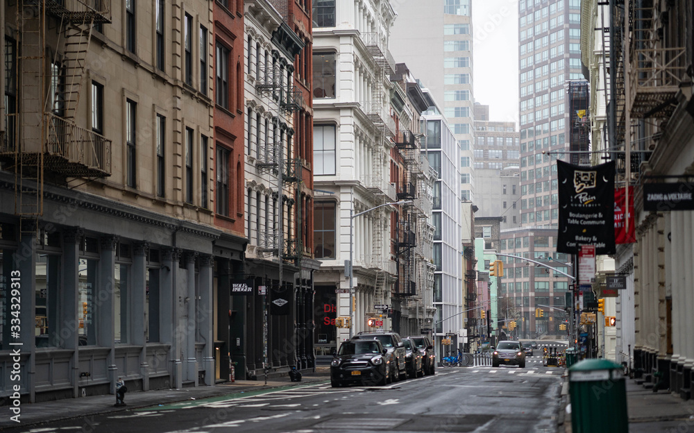 Fototapeta premium Empty New York City streets without people and closed shops during pandemic coronavirus outbreak in America. 