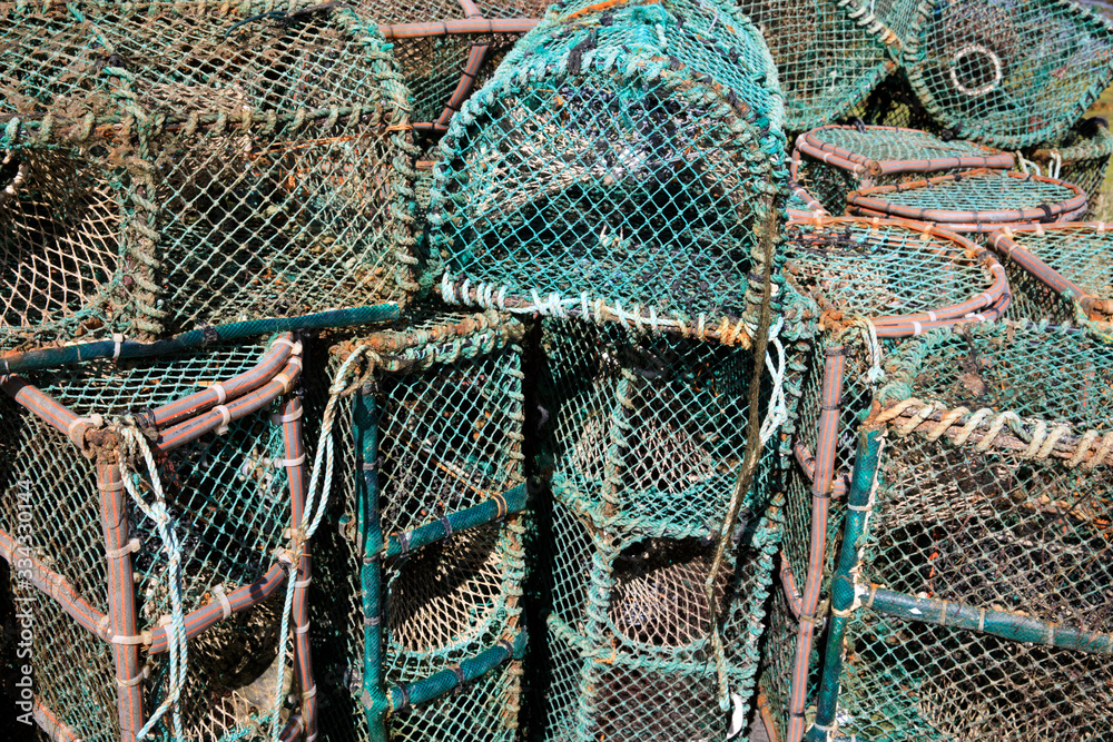 Orkney (Scotland), UK - August 10, 2018: Lobster and crab fishing pots piled in the port, Orkney, Scotland, Highlands, United Kingdom