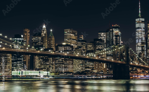 New York City skyline night view. Brooklyn bridge night view. World Trade Center night view. 